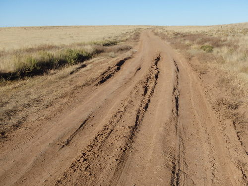 GDMBR: This stretch of road is OK for now but it would be miserable in the rain.